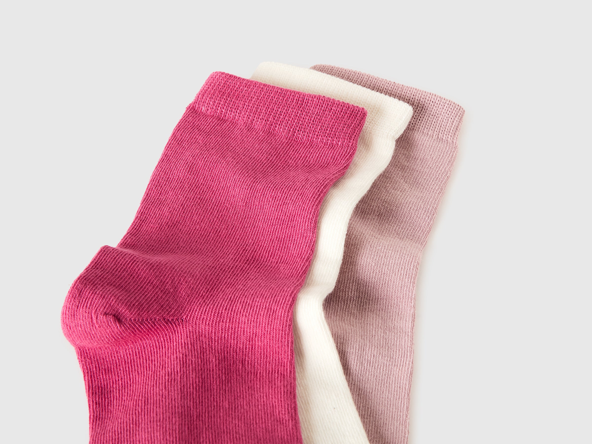 Three pairs of solid-colored medium socks - ucb_image_DS1