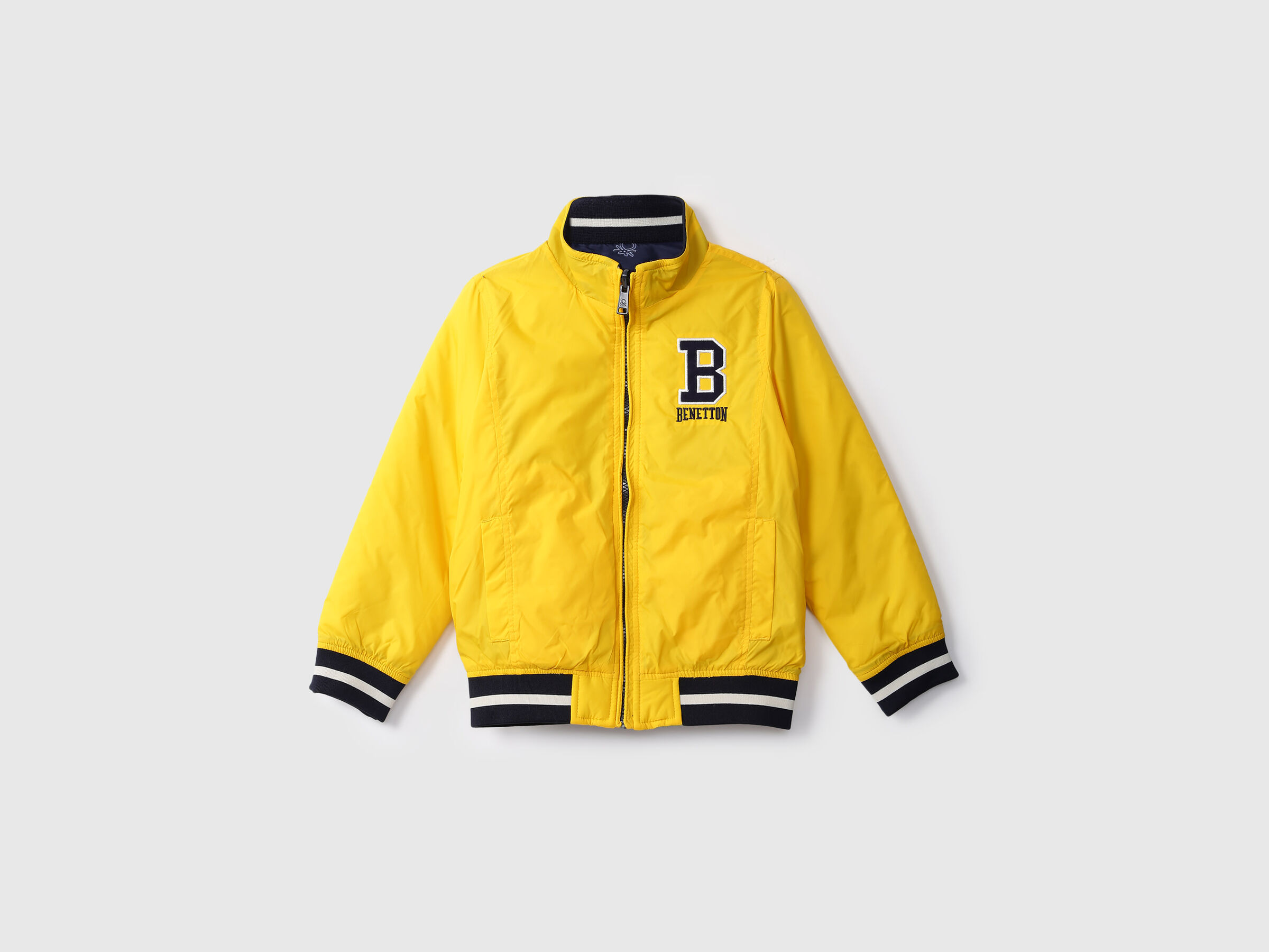 REVERSIBLE JACKET WITH AOP AND BADGE image number 0