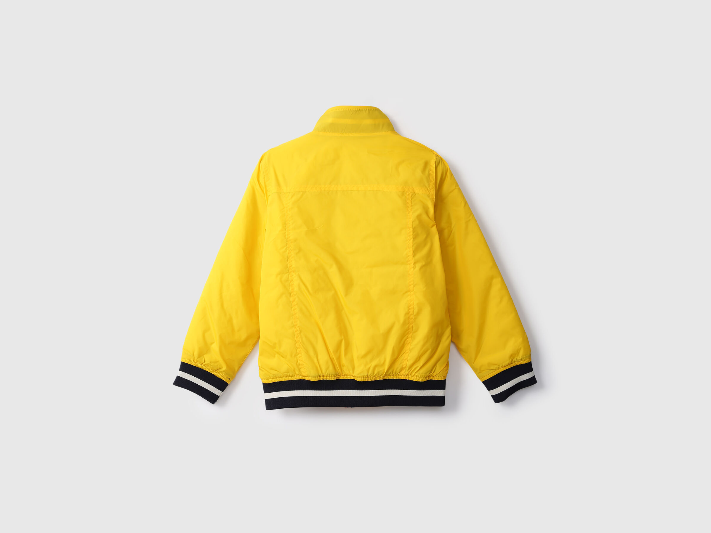 REVERSIBLE JACKET WITH AOP AND BADGE image number 1