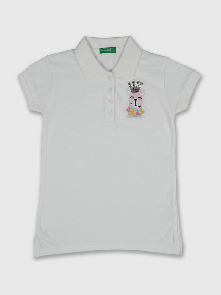 Solid Polo With Llama Badge