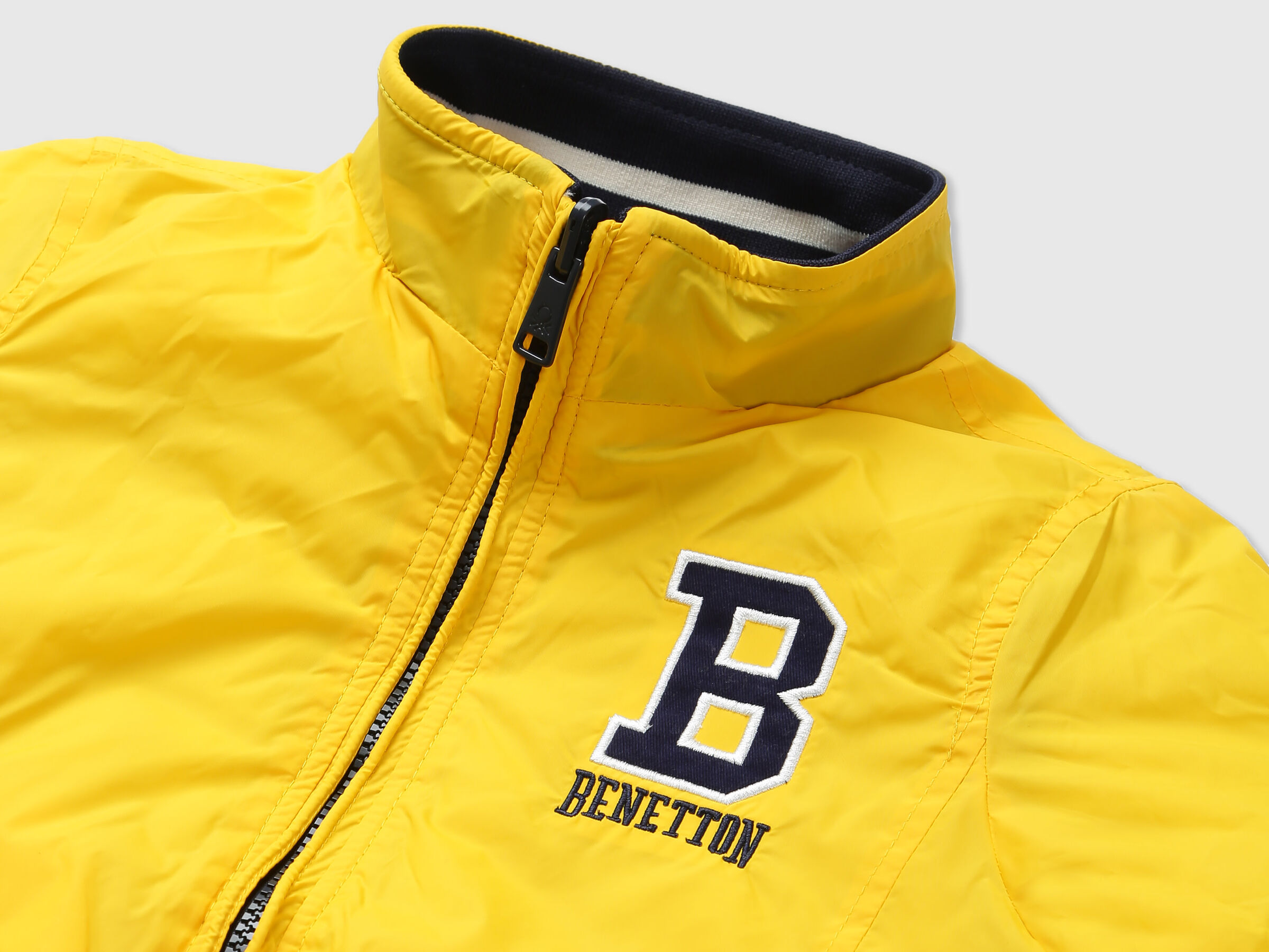 REVERSIBLE JACKET WITH AOP AND BADGE image number 2