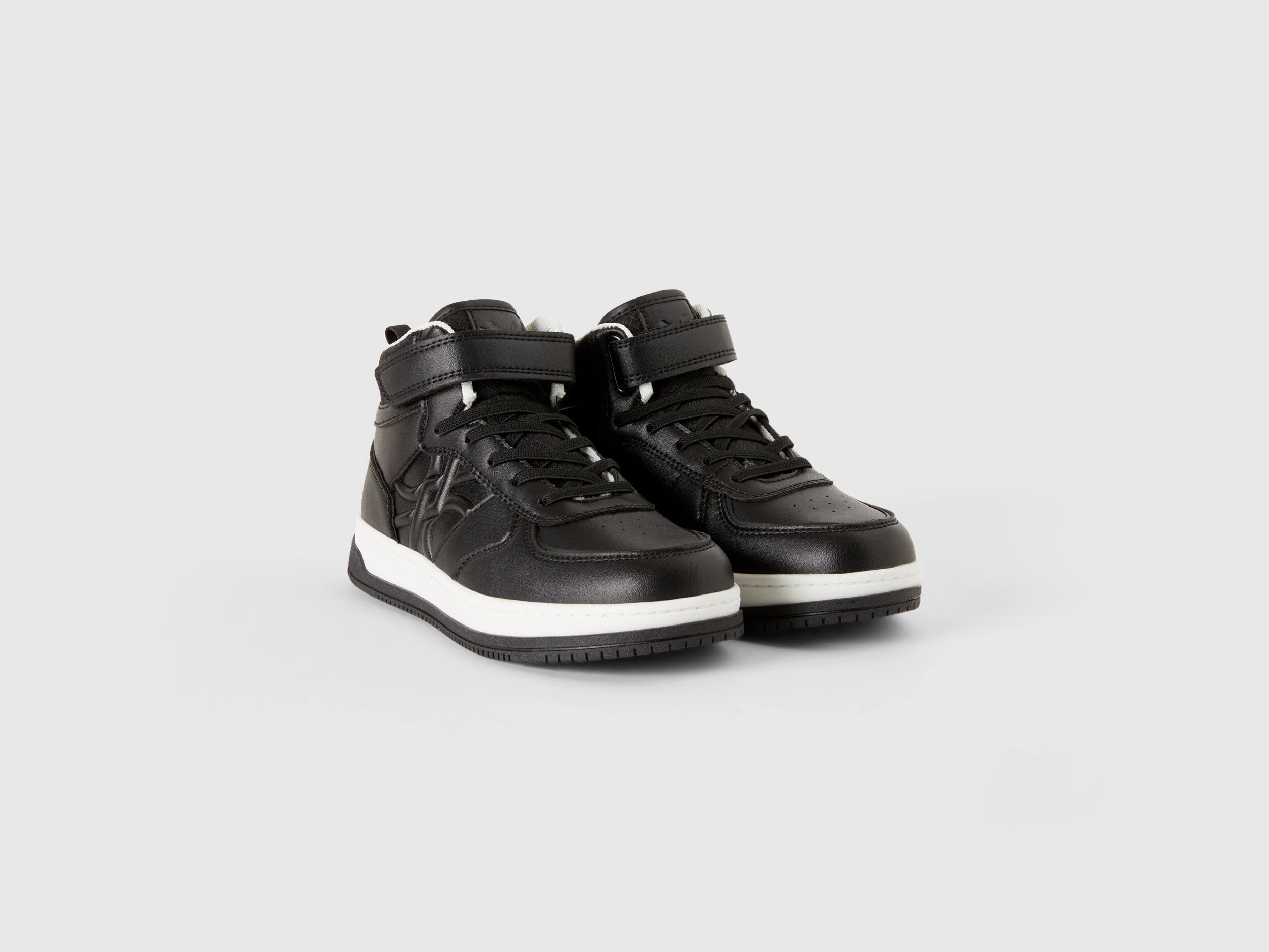 Ucb mid top discount sneakers