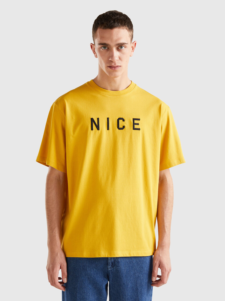 T-Shirt mit aufgedrucktem Slogan - | Benetton Gelb
