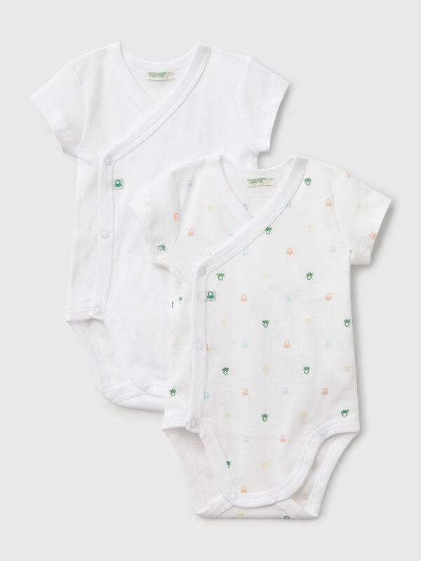 Zwei Bodys aus Baumwolle Newborn