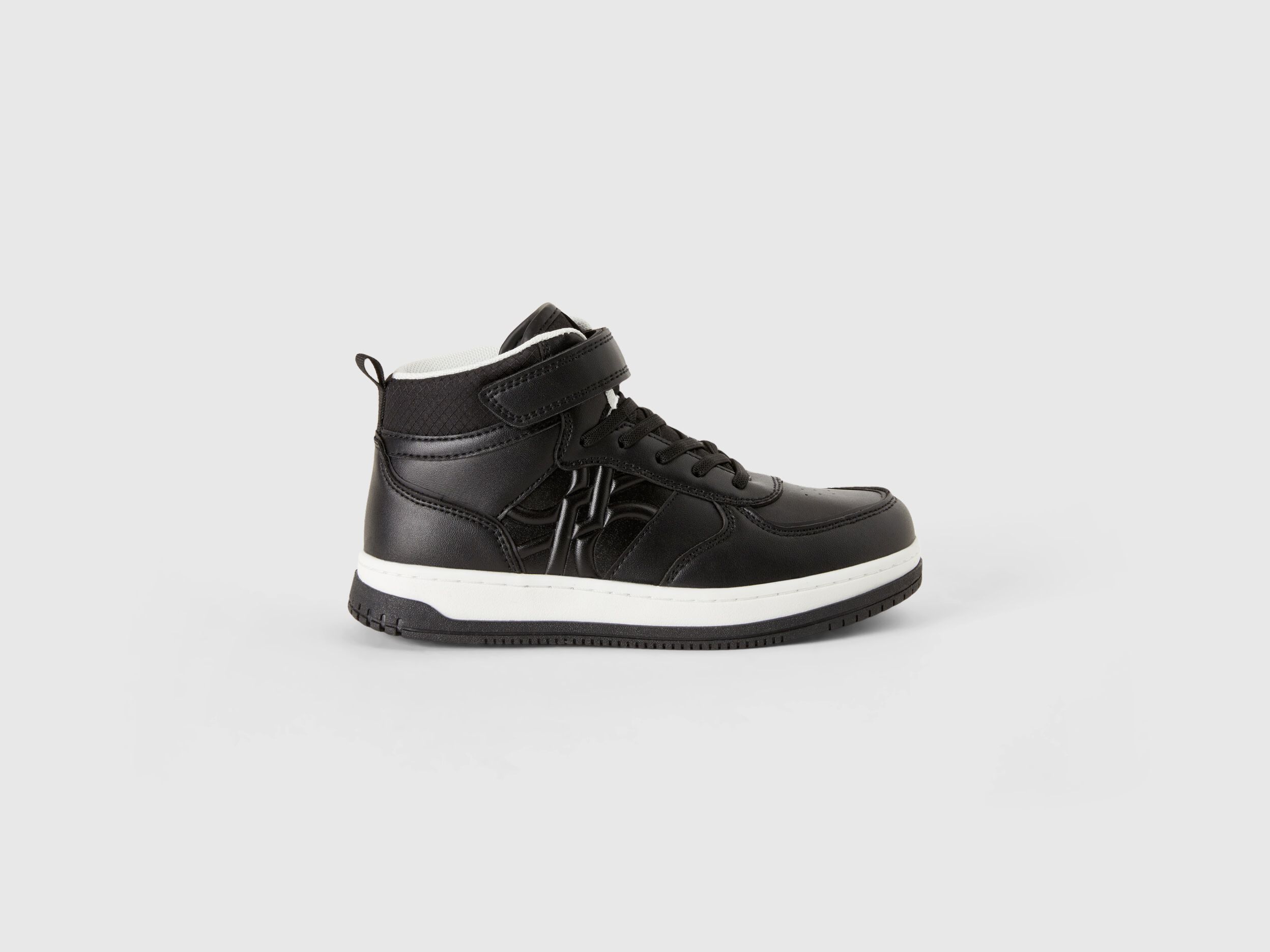 Ucb mid new arrivals top sneakers
