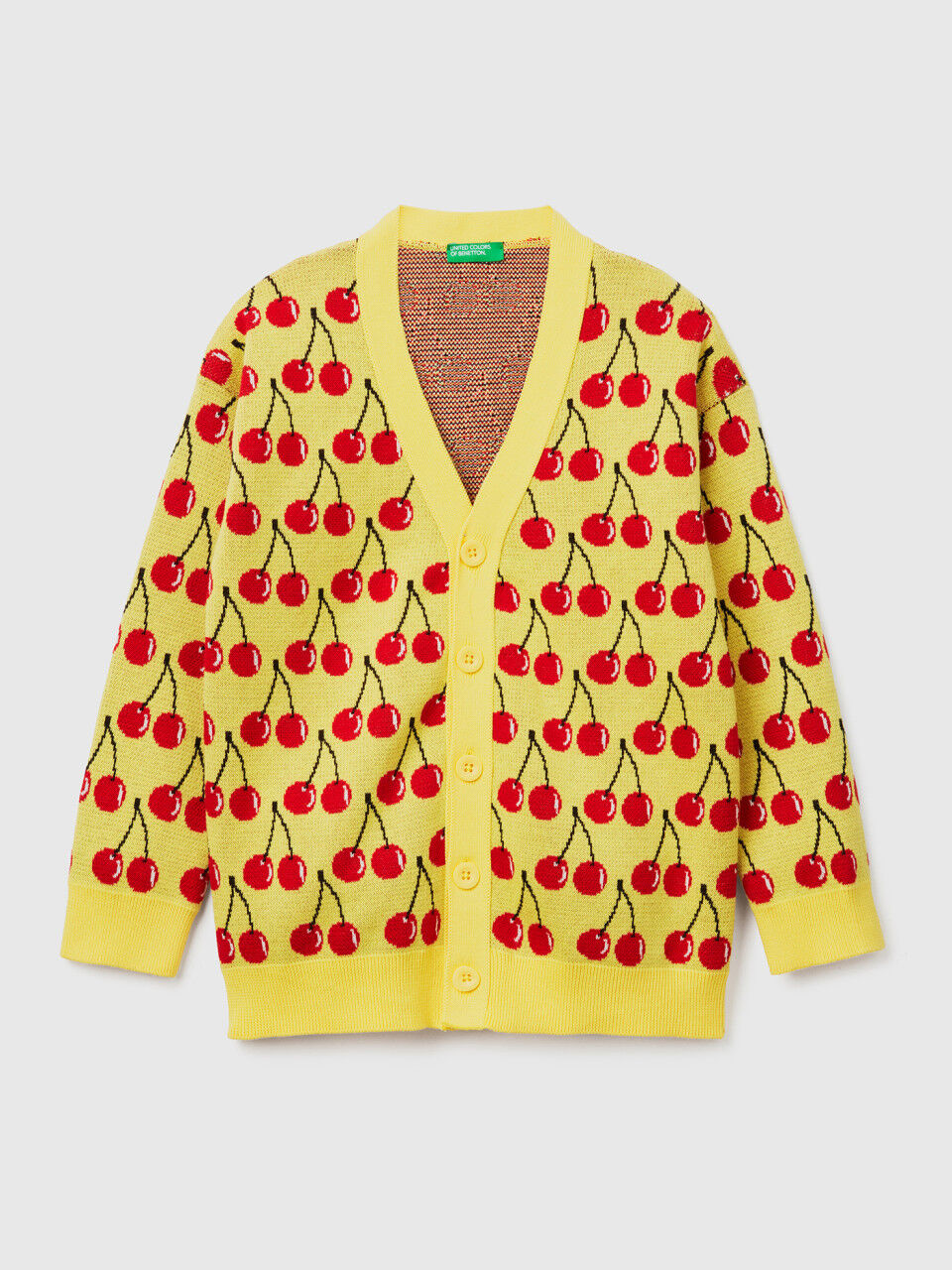 Yellow cardigan with cherry pattern
