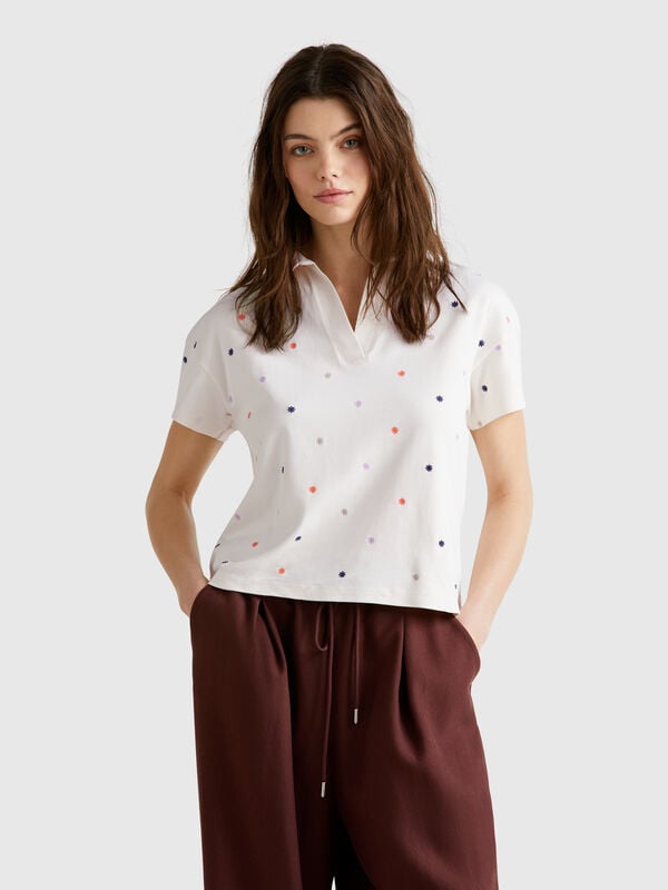 Polo con ricamo fiori Donna
