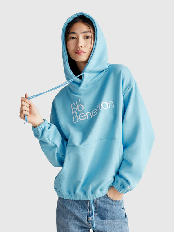 Sweat avec poche et capuche Femme