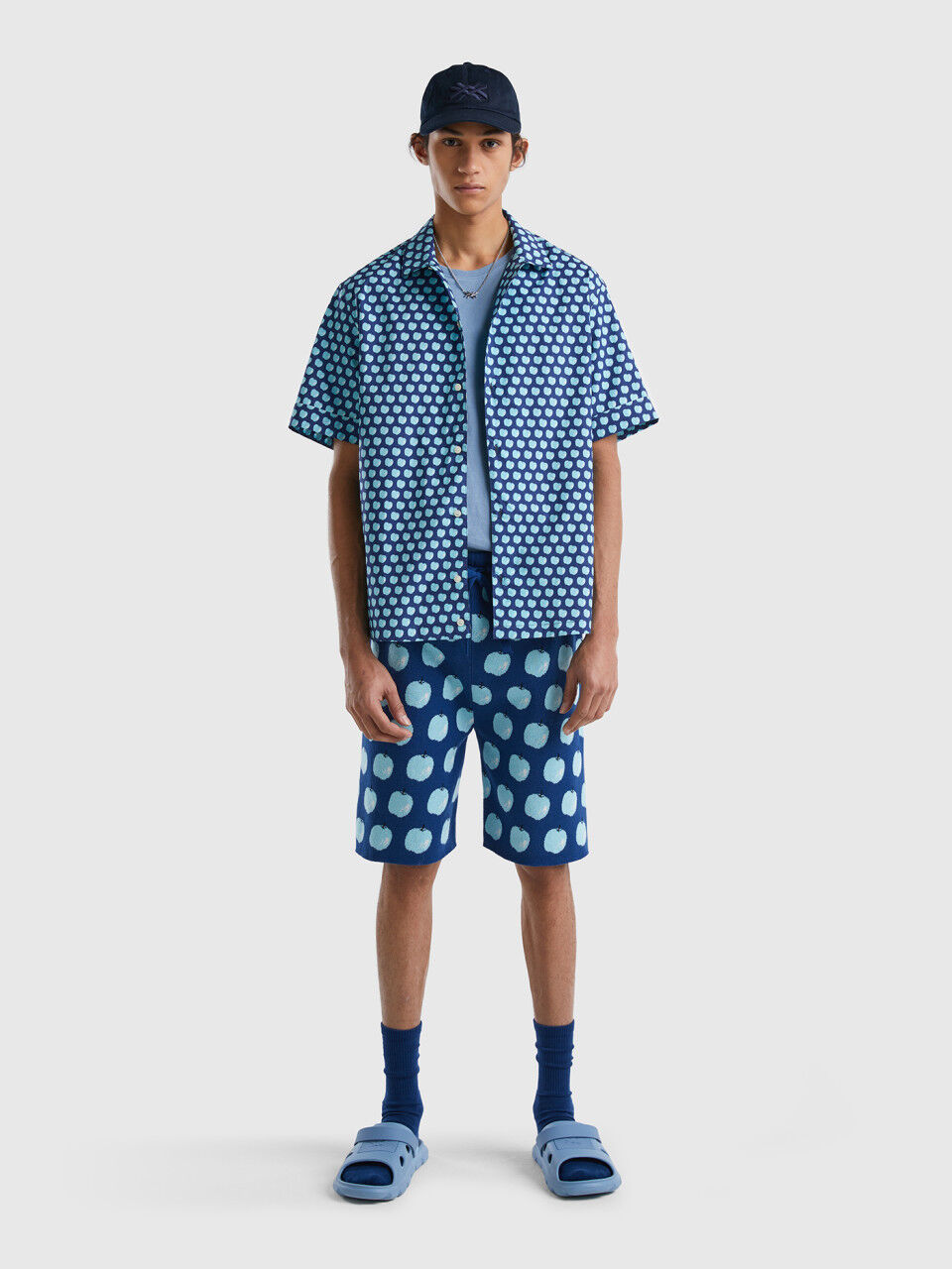 Blue shirt with apple pattern