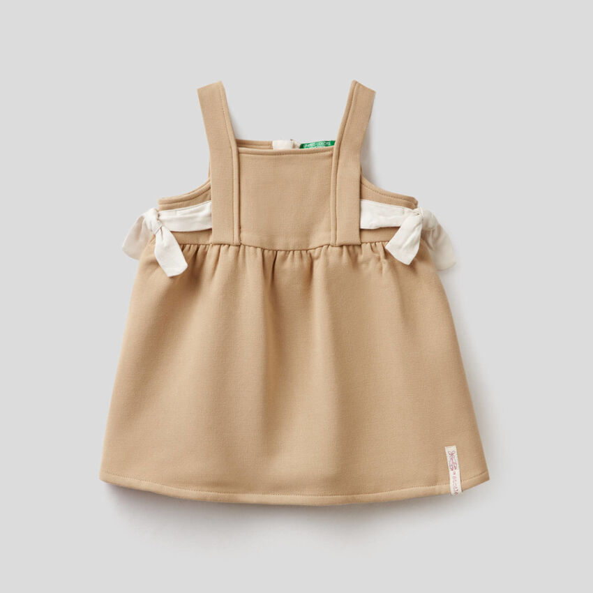 Dungaree dress with bows