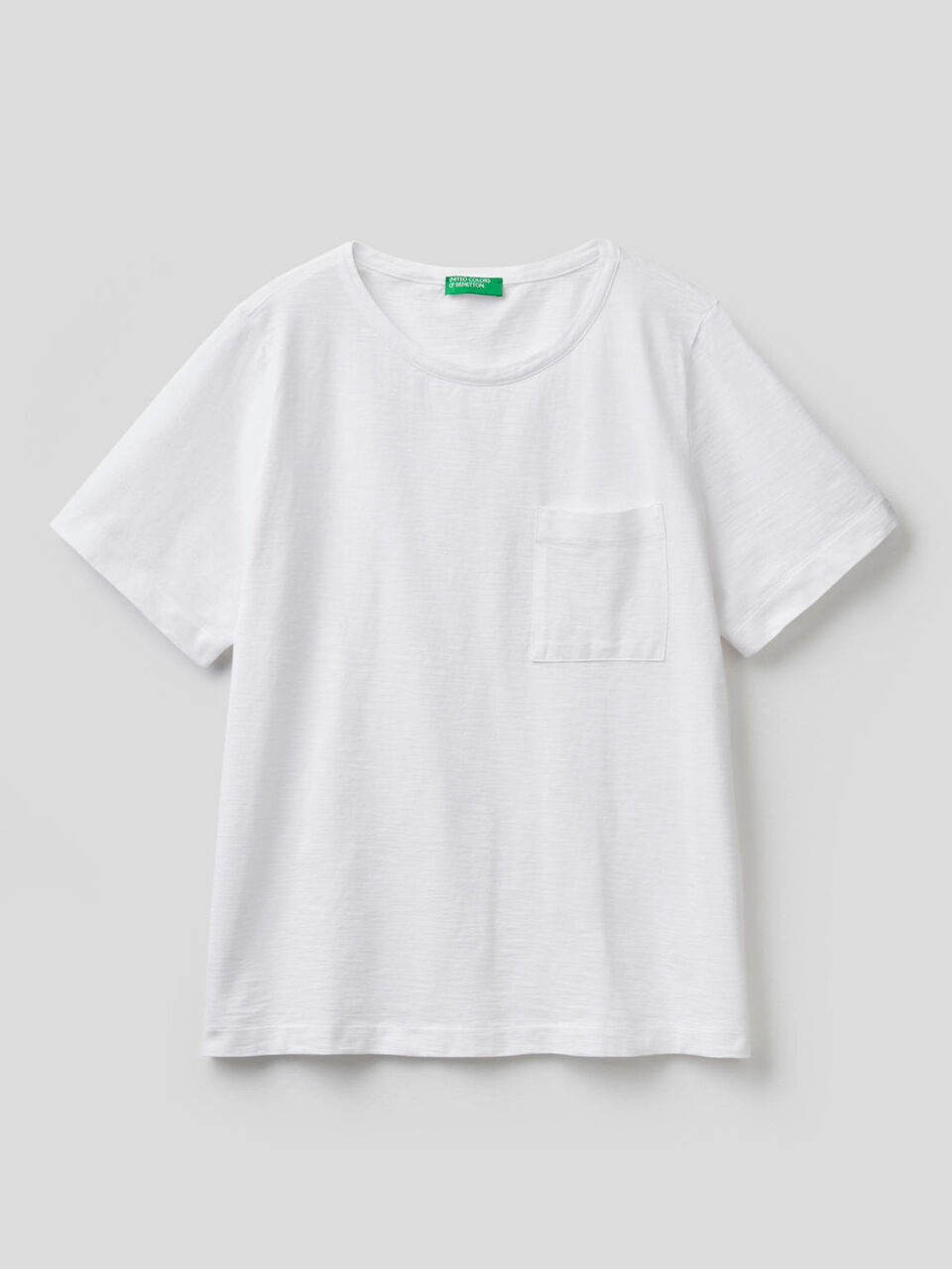T-shirt tinta unita con taschino image number 1