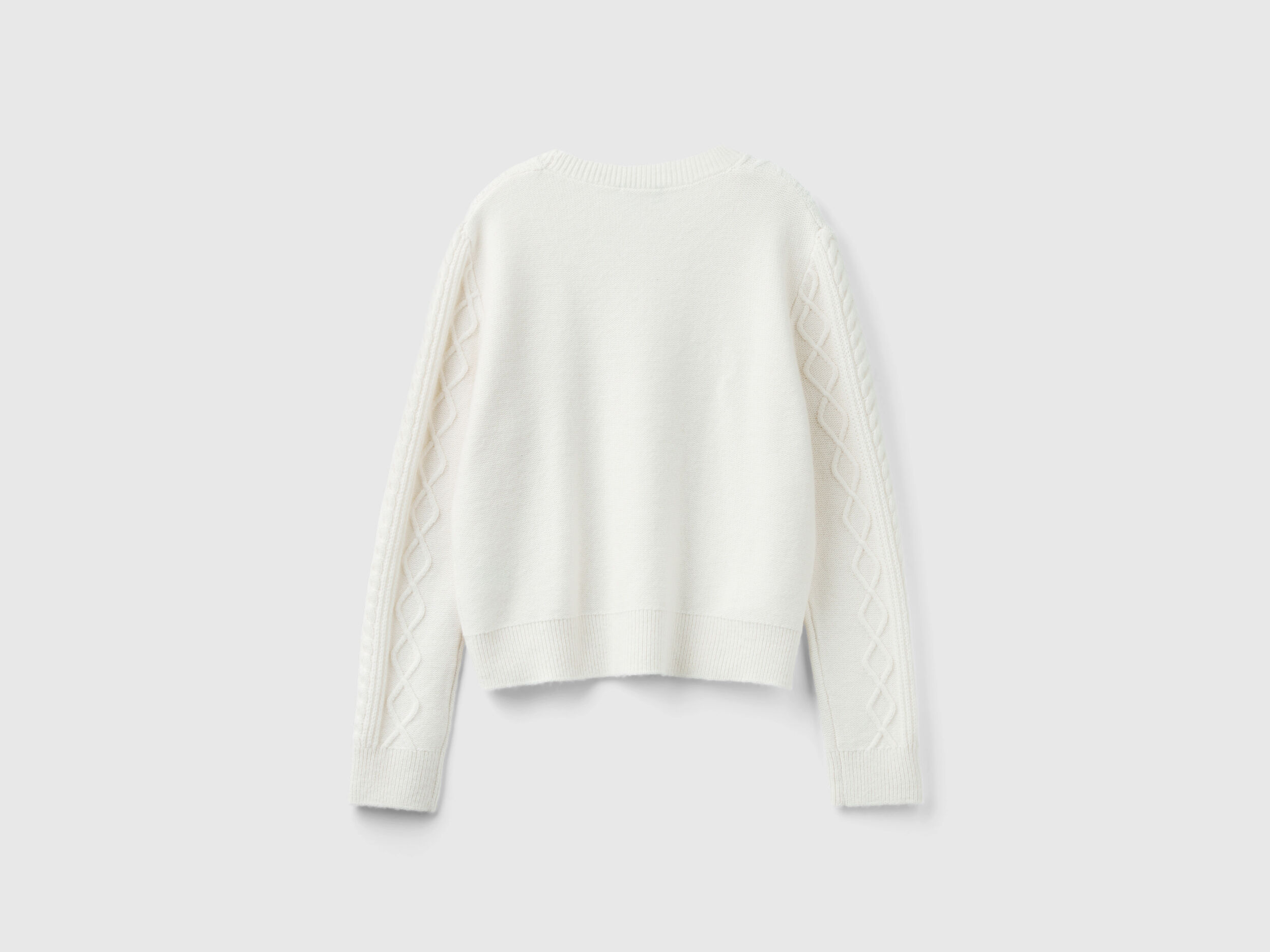 Sweater with cable knit and rhinestones - Creamy White | Benetton