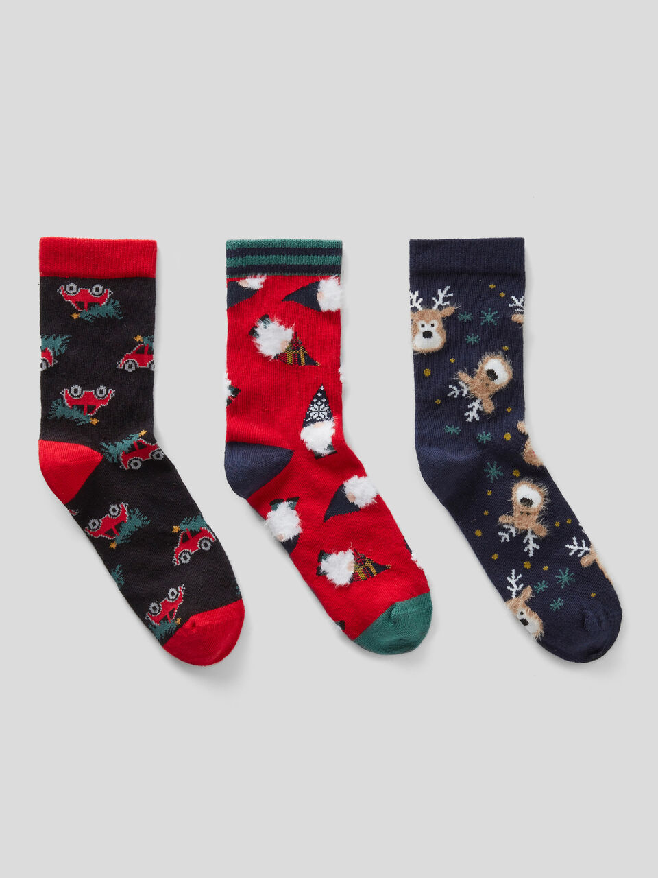 Three pairs of Christmas-style socks image number 1
