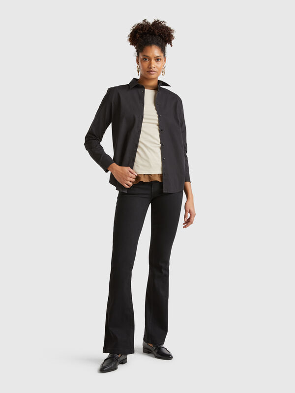 Jeans a zampa in misto cotone  Donna